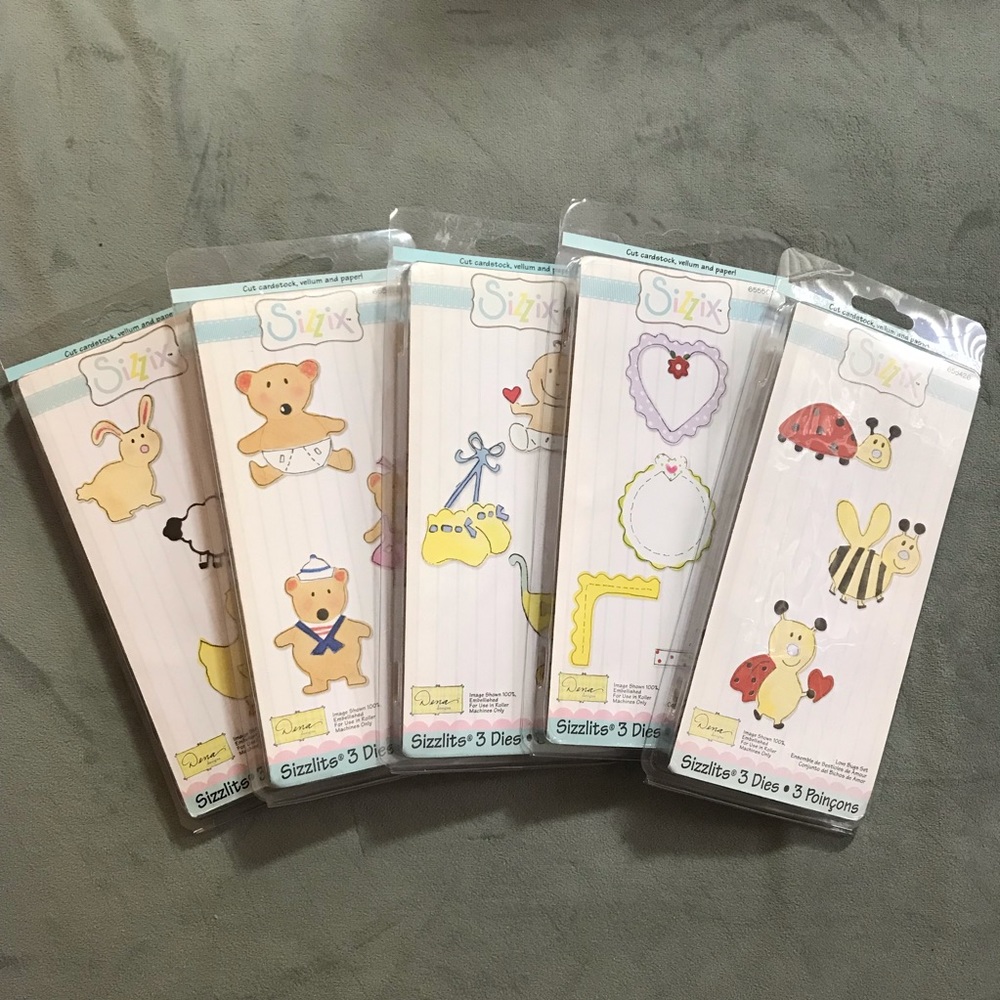 Sizzix 5 Sizzlits sets (baby#5, baby bears, baby animals, love bugs, frames)